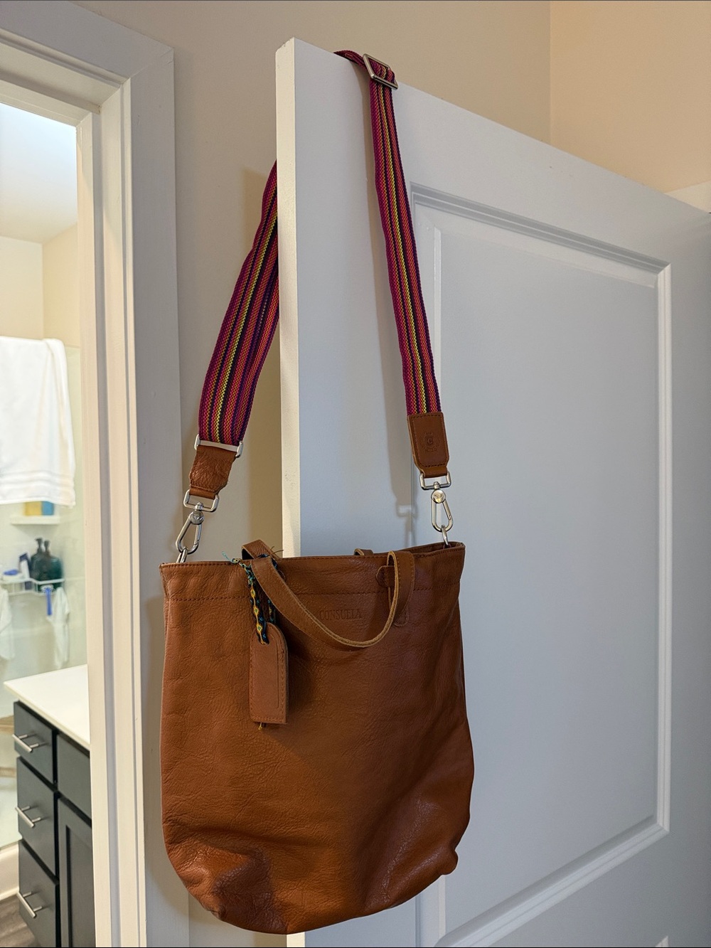 Consuela Brown Leather Shoulder Bag with Striped Pink Strap